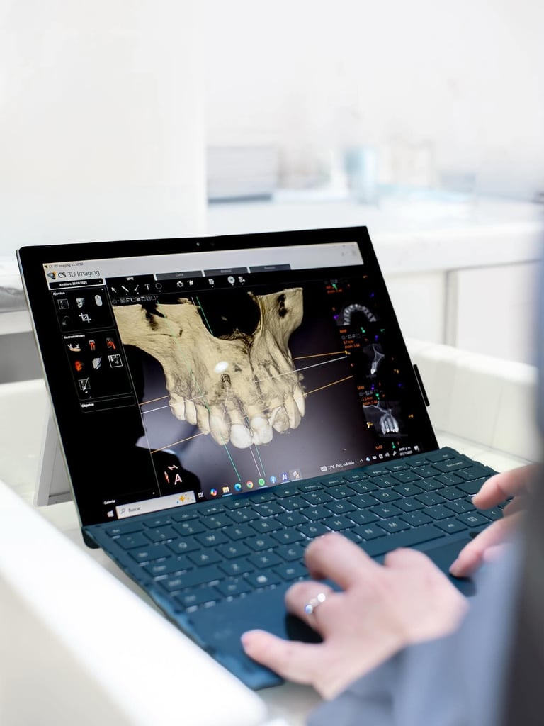 Person working on a tablet displaying a 3D rendering of an anatomical hand model in design software